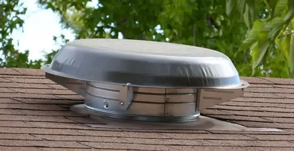 attic fan installation services with low-profile roof ventilation unit in Cleveland, OH