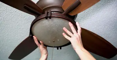 Ceiling fan repair and reinstallation on ceiling mount in Cleveland, OH
