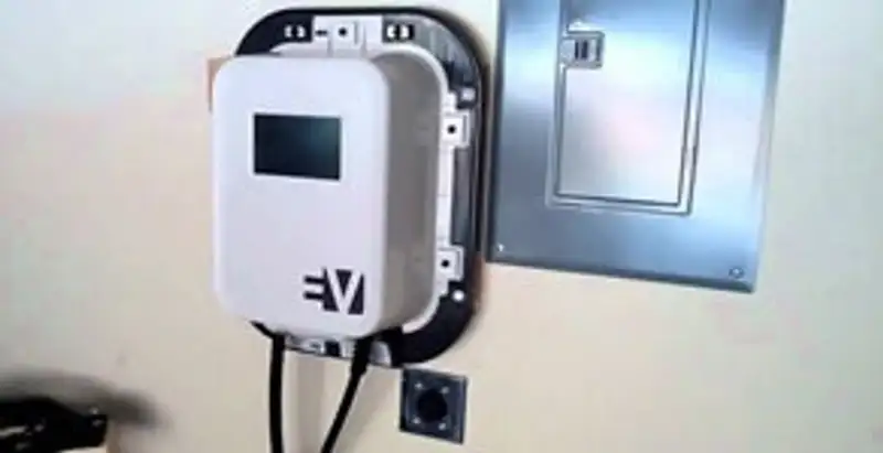 Electric car charger installation with wall-mounted EV charging station in Cleveland, OH