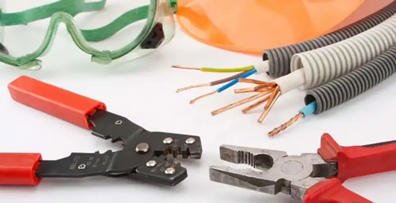 Electrical wiring repair with professional tools and safety equipment in Maple Heights, OH