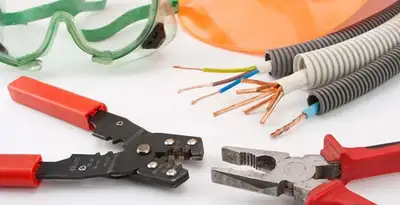 Electrical wiring repair with professional tools and safety equipment in Rocky River, OH