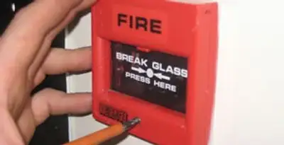 fire alarm installation service showing manual fire alarm pull station installed by licensed electricians in Cleveland, OH