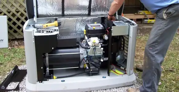 generator installation service showing technician connecting and configuring generator components in Cleveland, OH