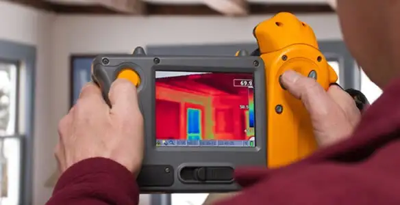 home energy audit service capturing thermal readings to analyze insulation and electrical efficiency in Cleveland, OH