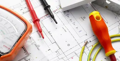 licensed electrician planning and testing electrical systems using professional tools in Cleveland, OH