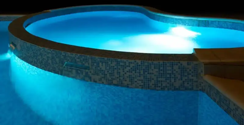 pool light installation and repair services highlighting illuminated pool interior lighting in Cleveland, OH