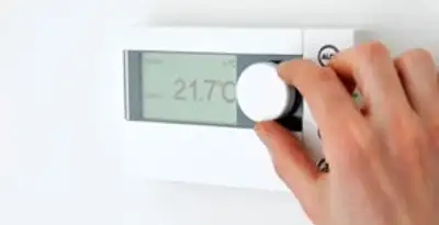Thermostat installation service with professional adjusting temperature control in Cleveland, OH