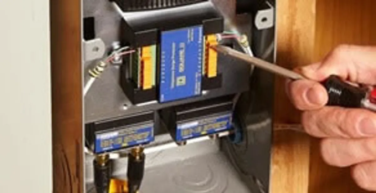 Whole home surge protection device being installed by a licensed electrician to protect electrical systems in Cleveland, OH