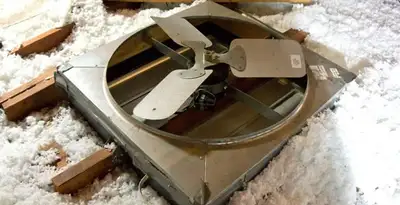 whole house fan installation services with attic-mounted ventilation unit in Cleveland, OH