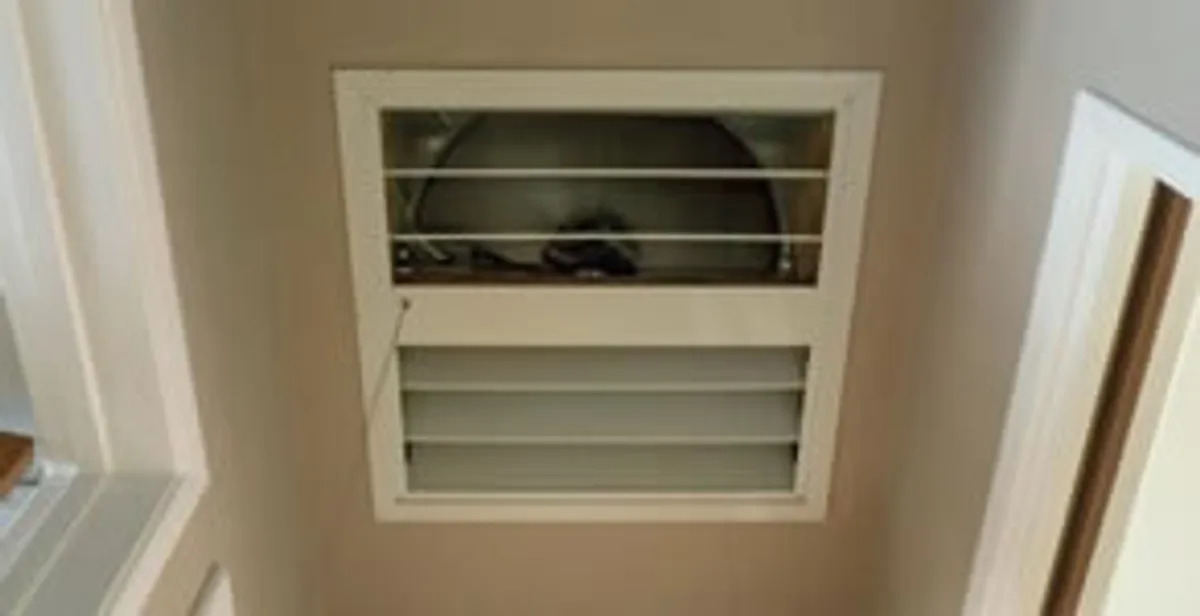 whole house fan installation services with ceiling-mounted ventilation system in Cleveland, OH